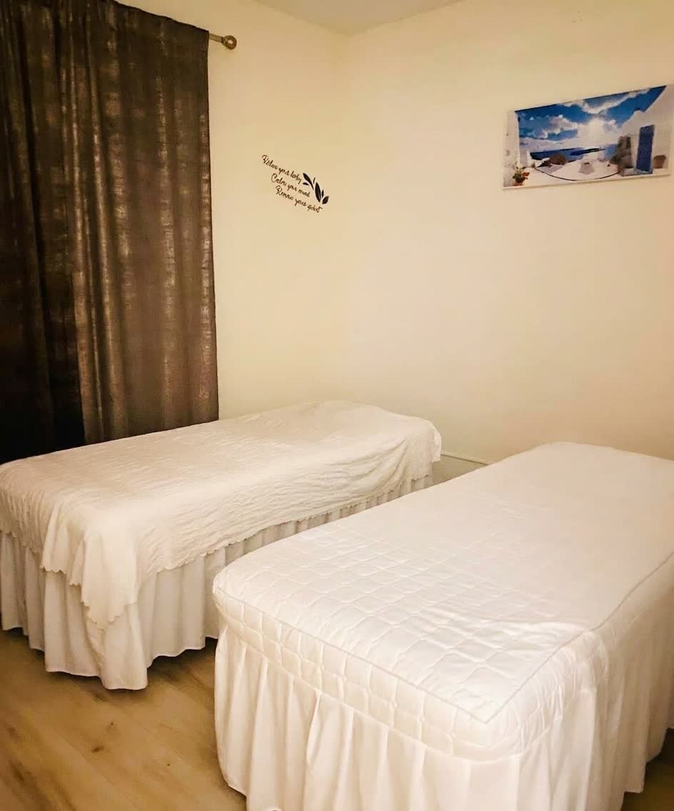 The couples room at Seattle Head Spa with two treatment beds side by side